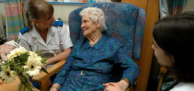 Nurse with elderly patient