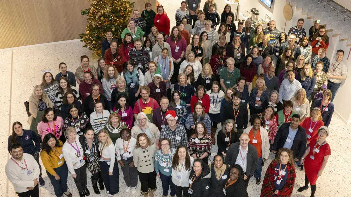 Group photograph of Usher colleagues gathering at the End of Year Celebration 2024