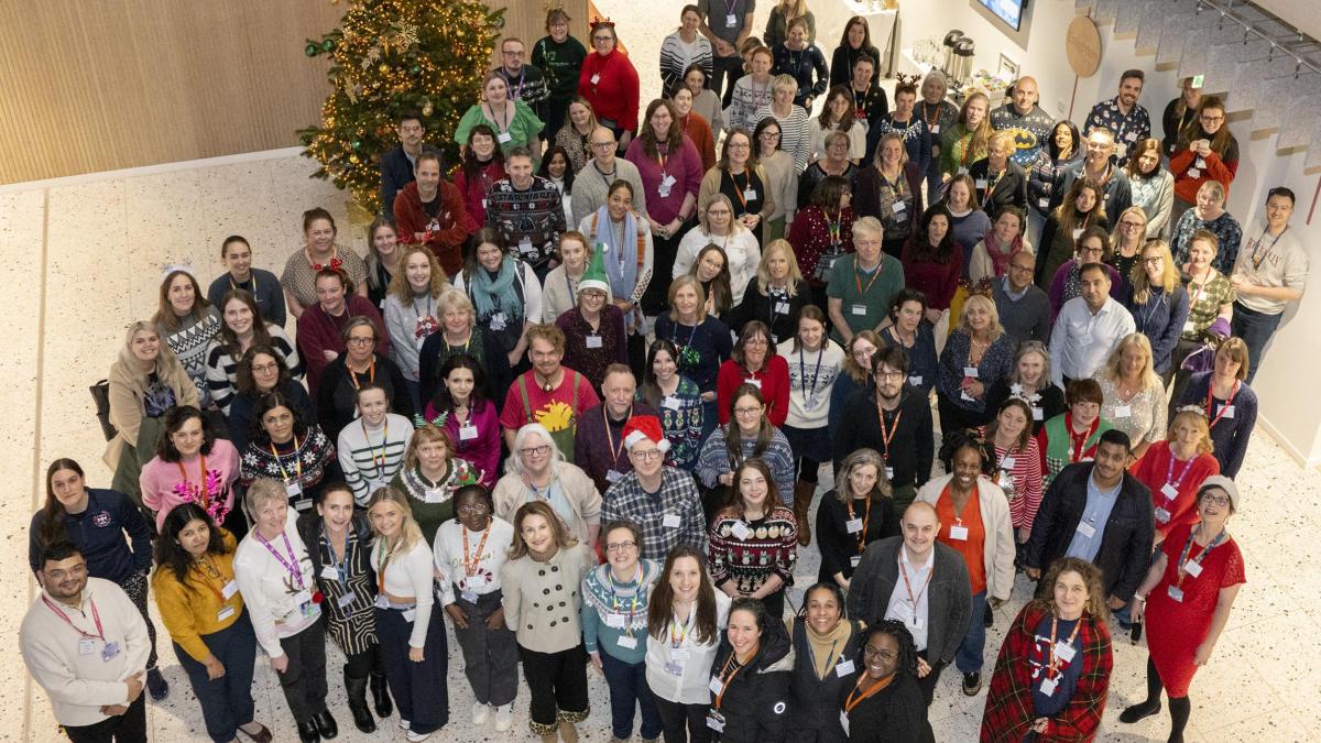 Group photograph of Usher colleagues gathering at the End of Year Celebration 2024