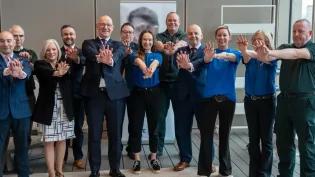 From left to right: Rodger Hill (David Hill Foundation), John Sinclair, Lesley Hill (David Hill Foundation), David McColgan (BHF Scotland), First Minister of Scotland John Swinney, David Argyle (University of Edinburgh), Dominika Skrocka (Save a Life for Scotland), Steven Short (Scottish Ambulance Service), Dr Gareth Clegg, Lisa MacInnes, Susan Gardner (all Save a Life for Scotland), David Bywater (Scottish Ambulance Service).