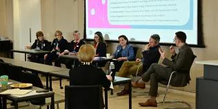 Martyn talks as the panel, seated, look to him and listen.