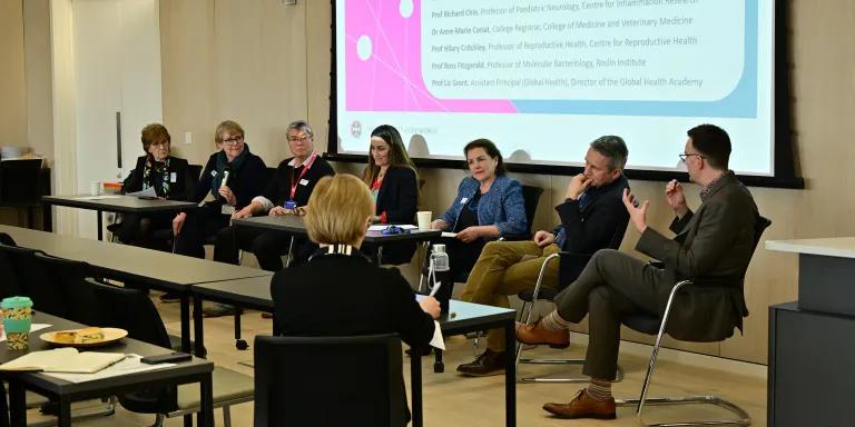 Martyn talks as the panel, seated, look to him and listen.