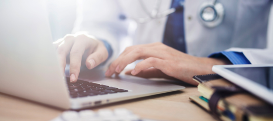 Doctor on laptop