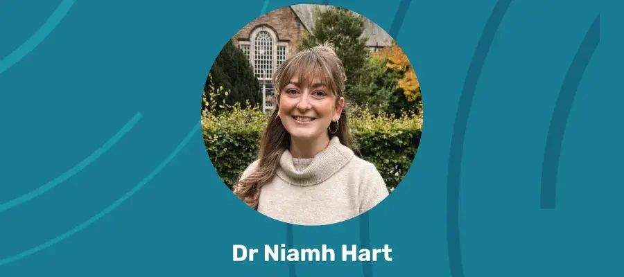 An image of a woman smiling in front of an Edinburgh University building and the text 'Dr Niamh Hart.'