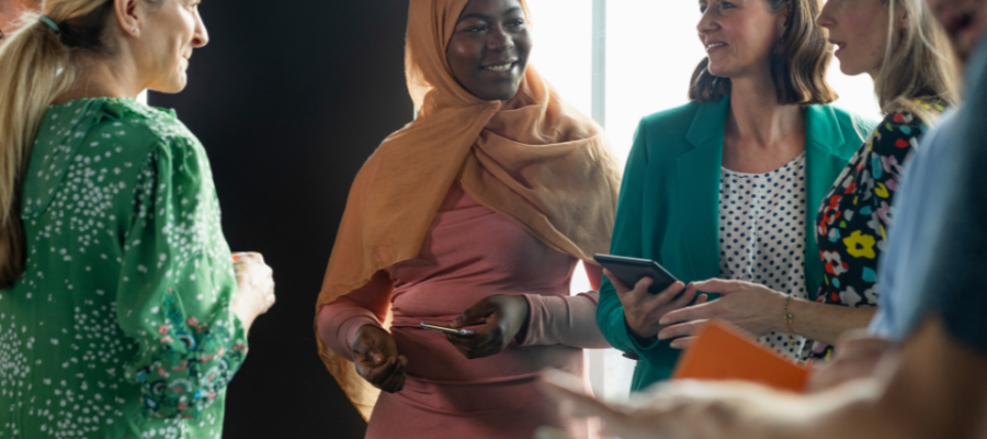 Group of women talking at an event