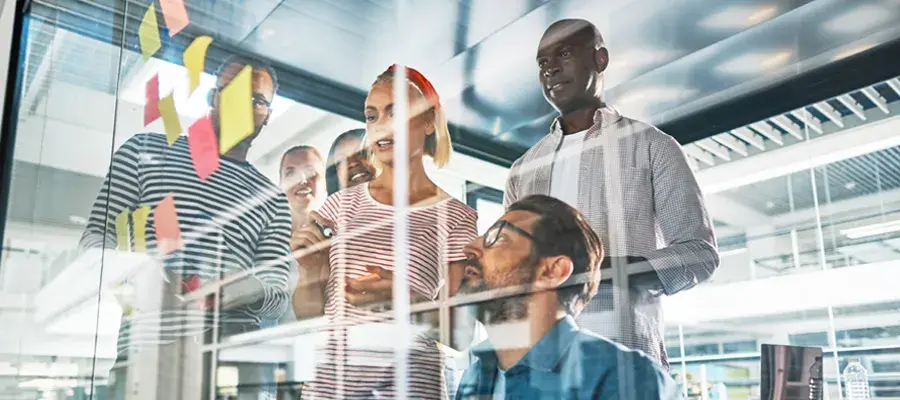 A group of diverse colleagues brainstorming together