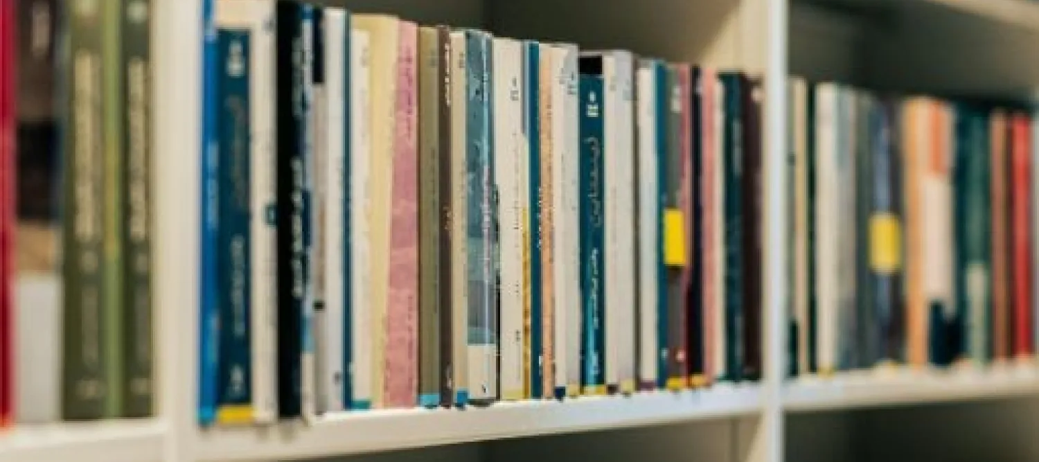 An image of library stacks of books.