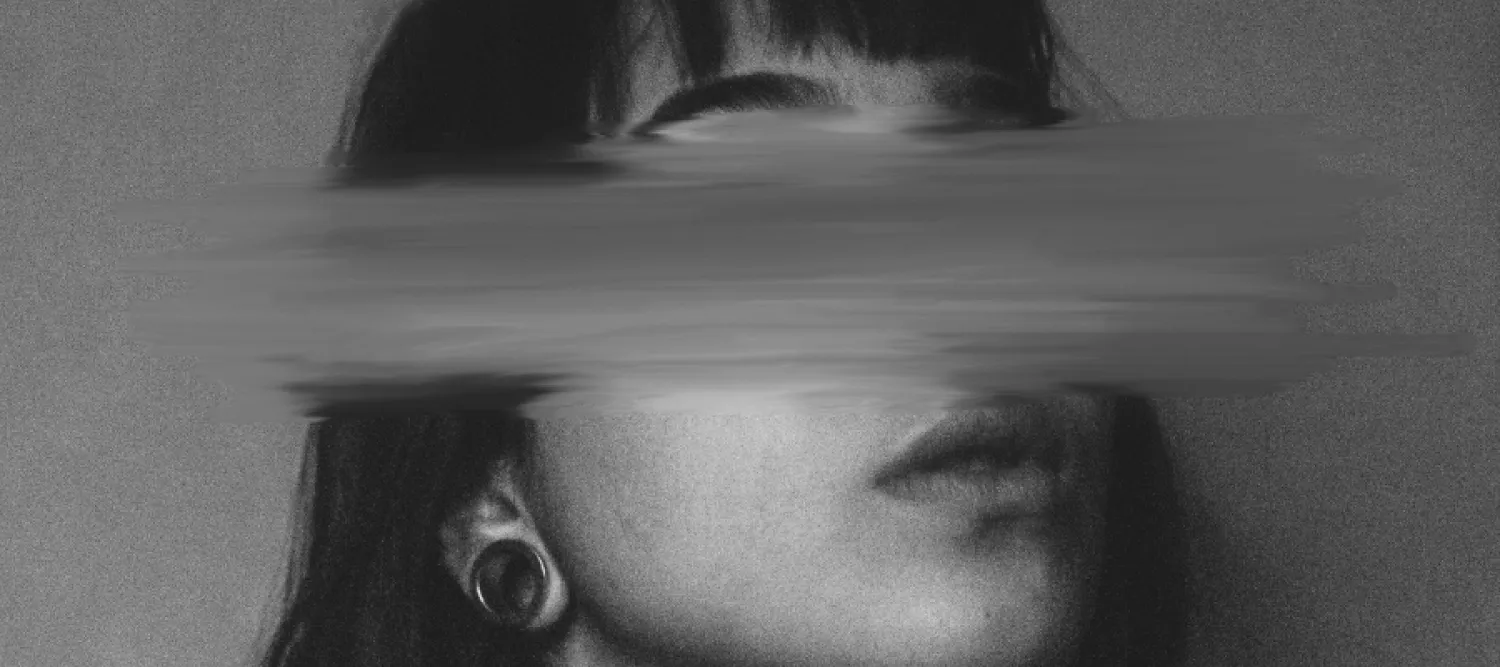 Woman with smeared eyes