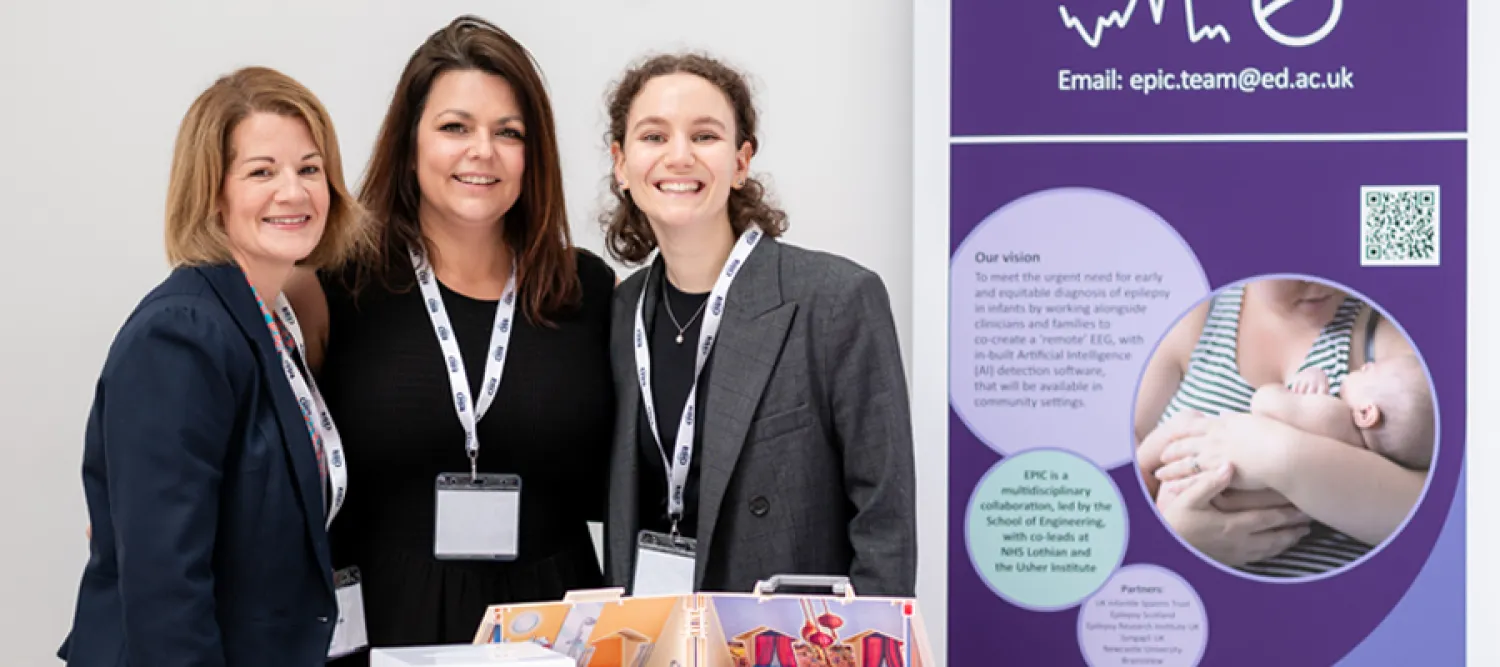 Three members of the EPIC team at a public engagement stall