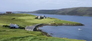 Remote houses on the Shetland coast