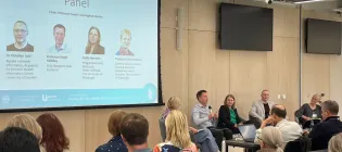 Photograph of presenters during the Usher Connects | Sudlow Review event