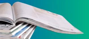 Blue-green background, white newspaper in front