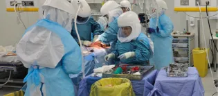 Photograph taken from the cover of the UK Chief Medical Officer's Annual Report 2025 depicting a simulated HCID exercise