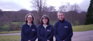 Professors Susan Shenkin, Heather Wilkinson and Ian Underwood outside at the Burn retreat