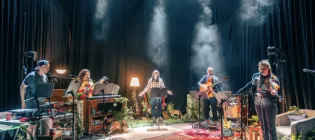 The cast of A Giant on the Bridge Onstage