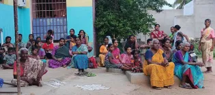 Gathering of women, elderly and children in rural India