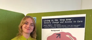 Rachel Thomsen with her interactive poster