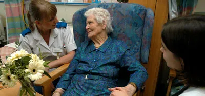 Nurse with elderly patient