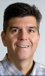 headshot of Carlos Camargo