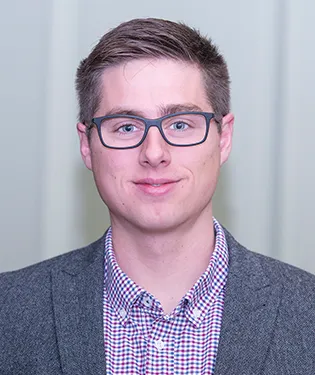 headshot of Charles Winn