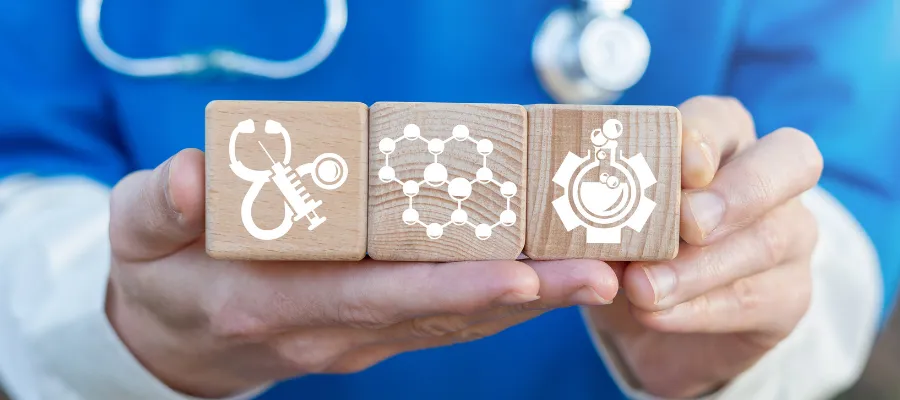 Image of a medical professional holding an atomic image of hormones