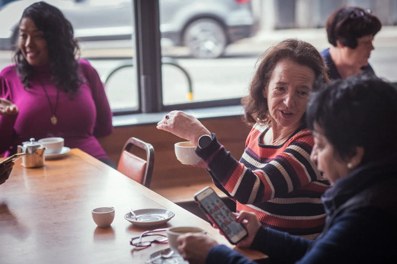 Group of older people in coffee shop