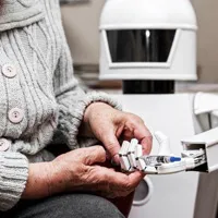Robot providing tablets to elderly patient