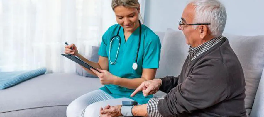 Elderly gentleman having measurement taken