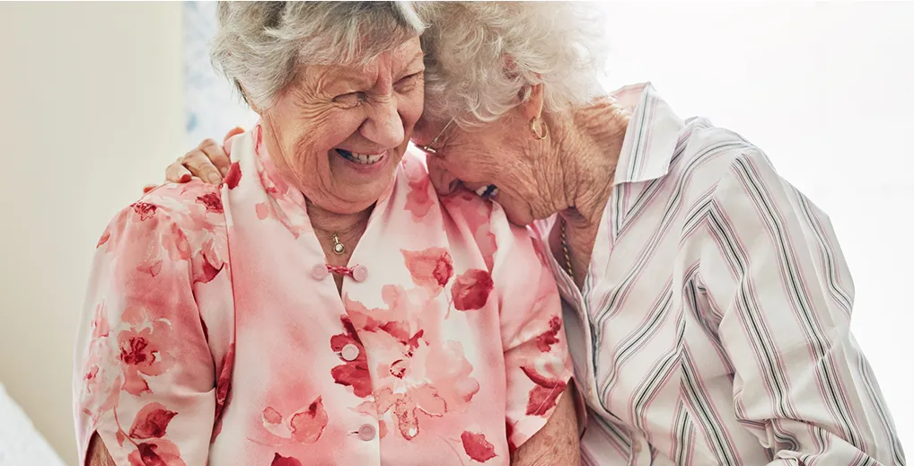 Two ladies laughing