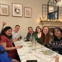 Fava Greek Restaurant – December 2024 Left to right: Farah Francis, Nandhni Gandhi, Mats Baxter, Aryelly Rodriguez, Marisa Muckian, Eleanor Dixon, Thulani Ashcroft