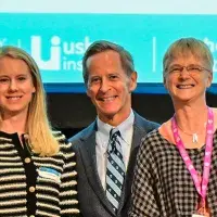 Photograph of poster prize winner, Susanne Maxwell, at the Usher Institute Annual Lecture & Showcase 2025 with David Nash and Cathie Sudlow