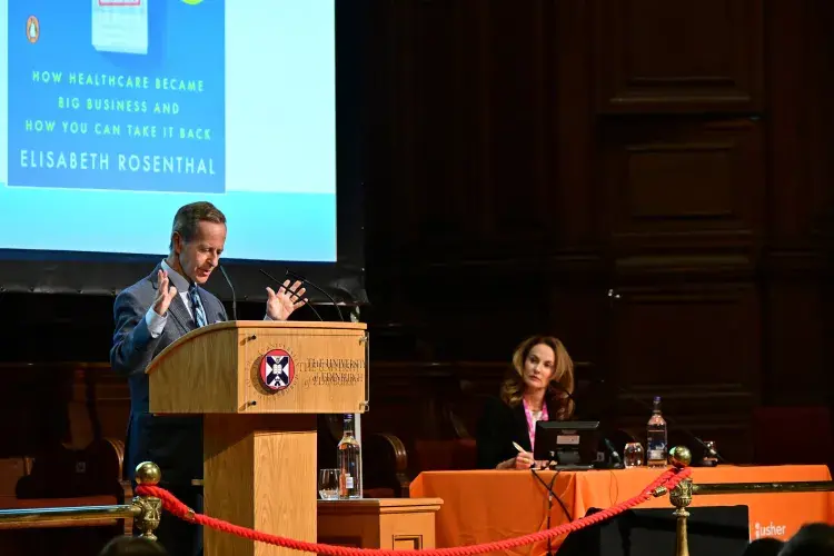 Photograph of Dr David B. Nash presenting at the the Usher Institute Annual Lecture and Showcase 2025