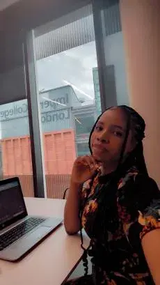 Eseosa Igbinosa, Inflammation and Immunity Intern, working in Imperial College London office