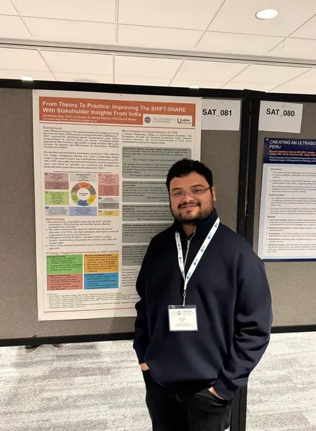 Shukanto Das, PhD student, standing at his poster at the CUGH 2025