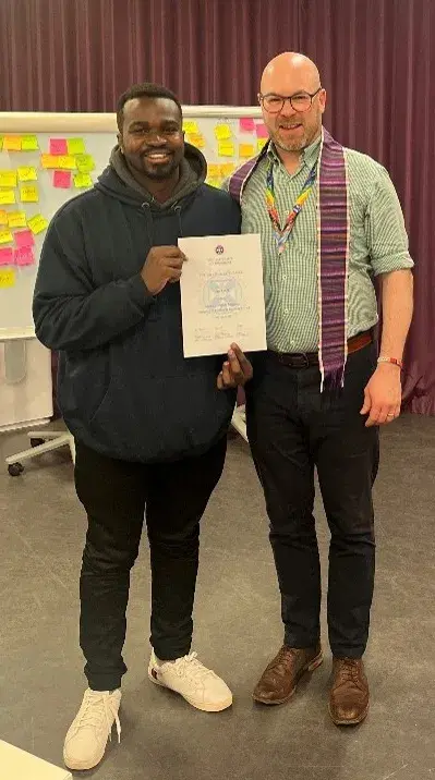 Photograph of Master of Family Medicine student, Ian Kibet, and Robin Ramsay at 2025 Summer School 