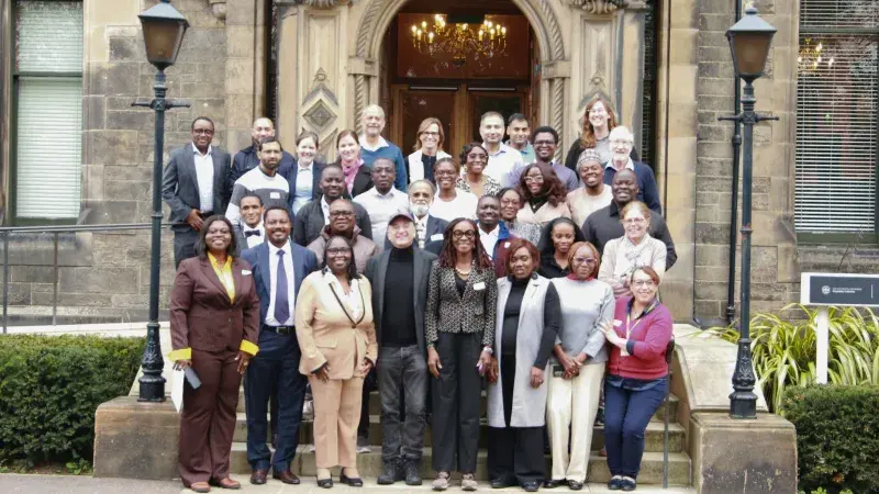 Group photograph taken outside a conference venue