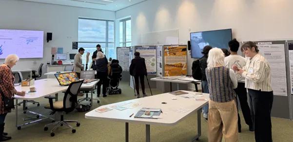 Attendees admiring the work of the students