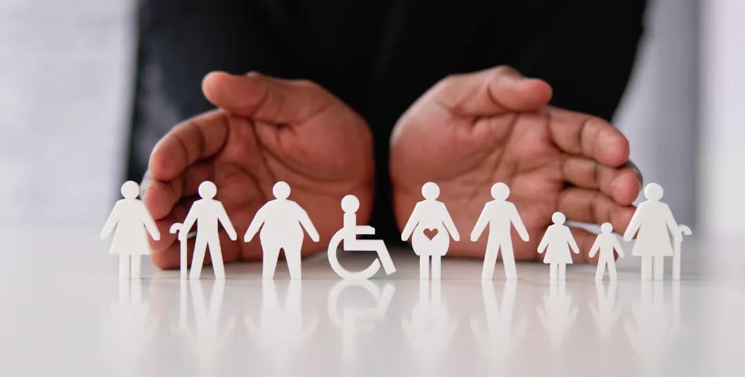 hands surrounding figures 