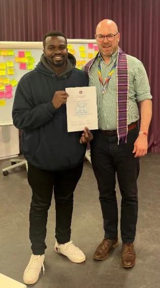 Photograph of Master of Family Medicine student, Ian Kibet, and Robin Ramsay at 2025 Summer School 