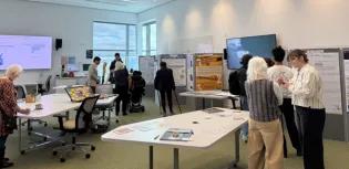 Attendees admiring the work of the students