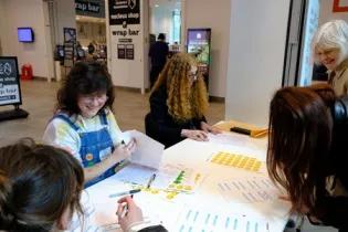 Welcoming attendees in the foyer of the Nucleus Building