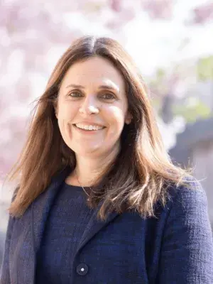 Professor Jenni Quint smiling at camera