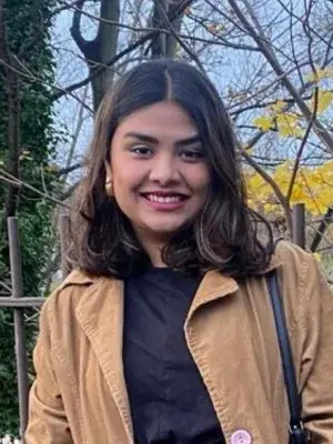 Head and shoulder profile photo of a woman outside
