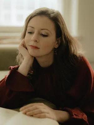 Lara Johnson reading a book