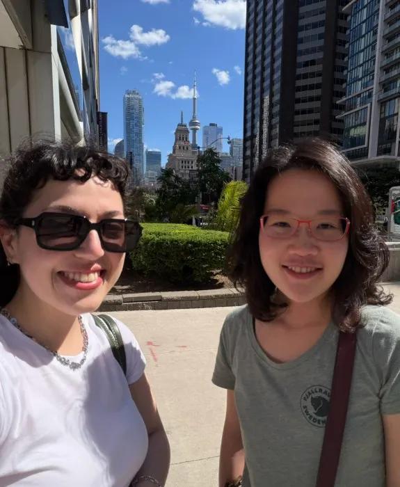 Szu-Chia and Deniz with the Toronto skyline behind