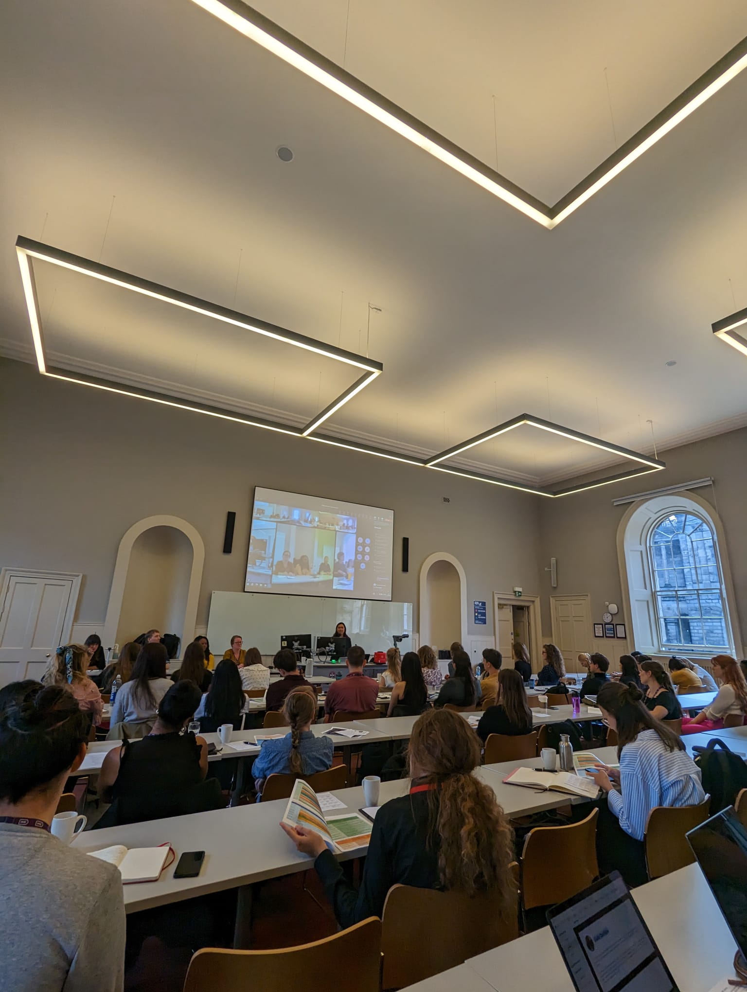 Conference delegates engaging in a workshop